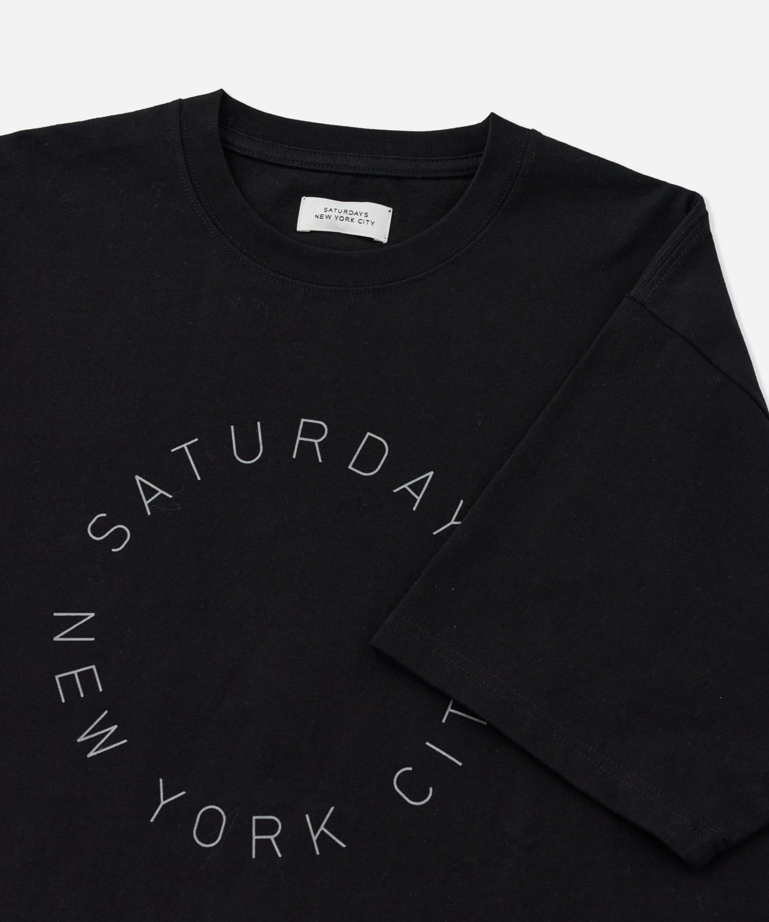 Saturdays NYC Circular Saturdays Logo Short Sleeve Tee in Black
