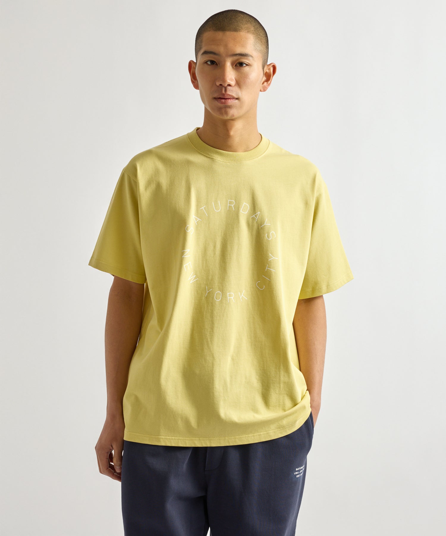 Saturdays NYC Circular Saturdays Logo Short Sleeve Tee in Yellow